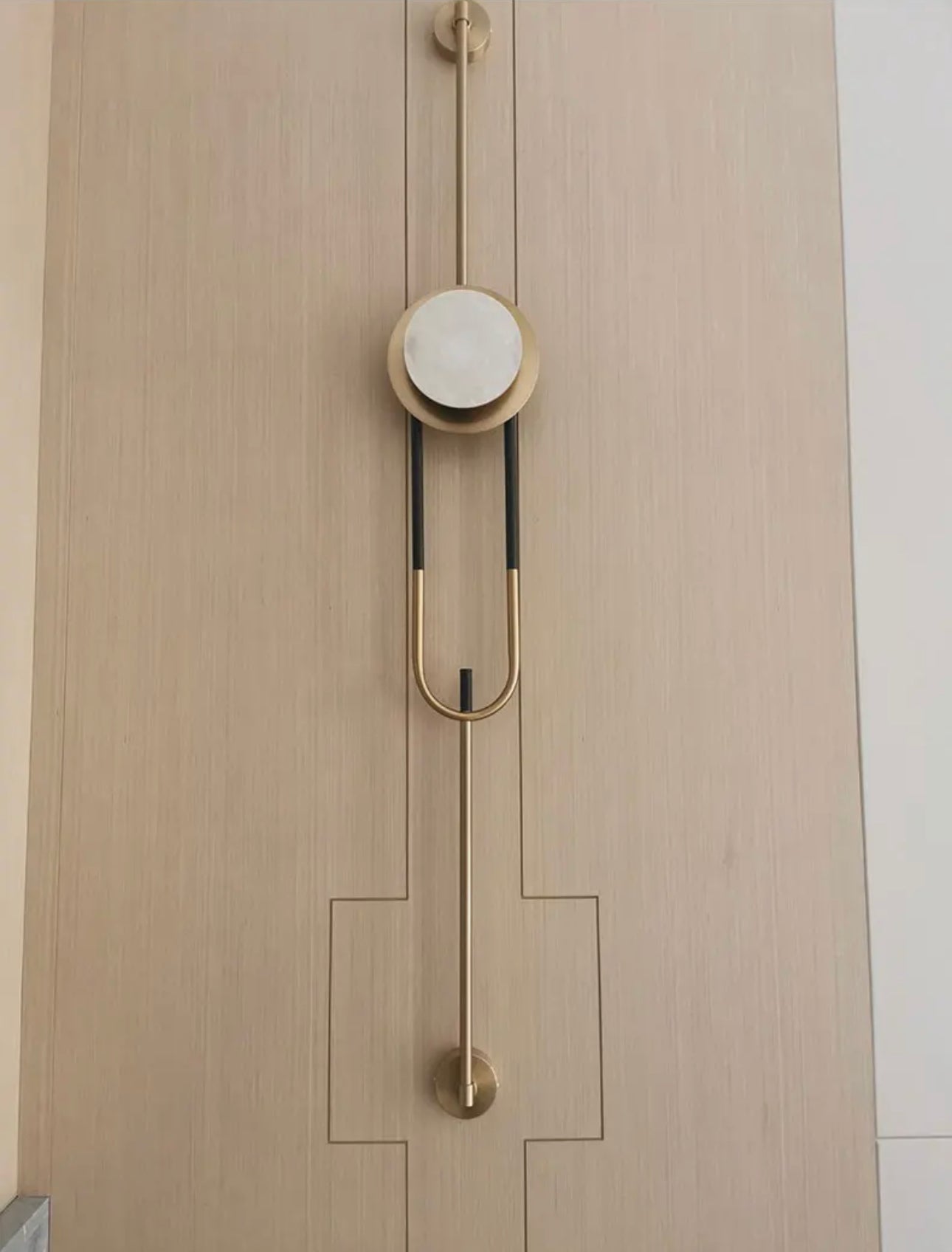 Aplique de pared con detalle en marmol