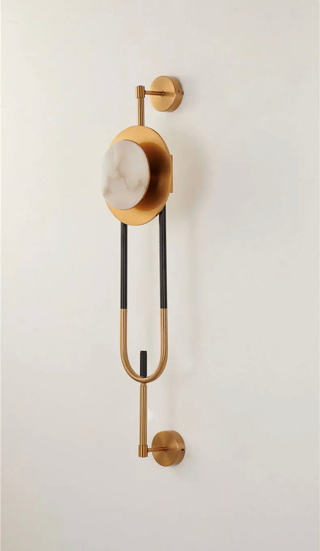 Aplique de pared con detalle en marmol